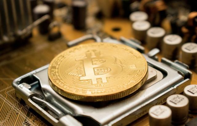 A dedicated miner meticulously monitoring the performance of their mining rigs.